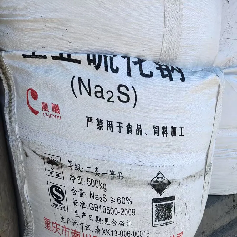 Pile of red sodium sulphide flakes 60%