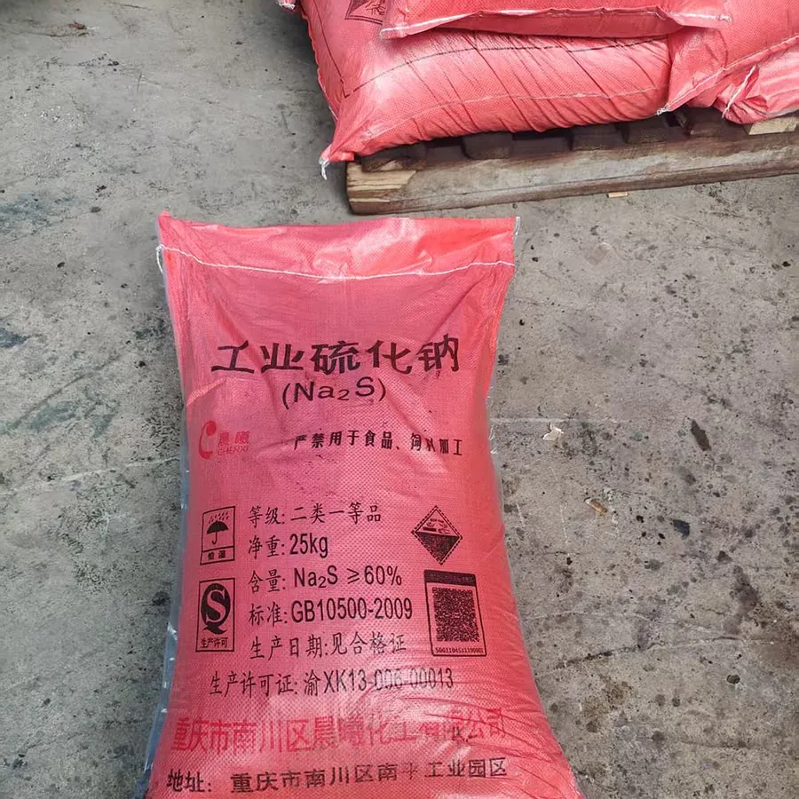 Pile of yellow sodium sulphide flakes 60%